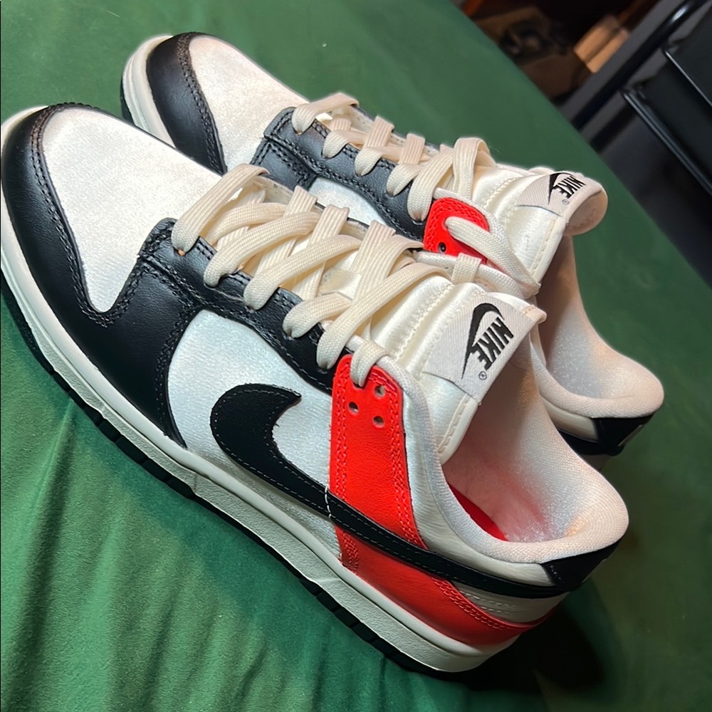 Nike Black and White Sneakers with Iconic Swoosh - Picture 2 of 5